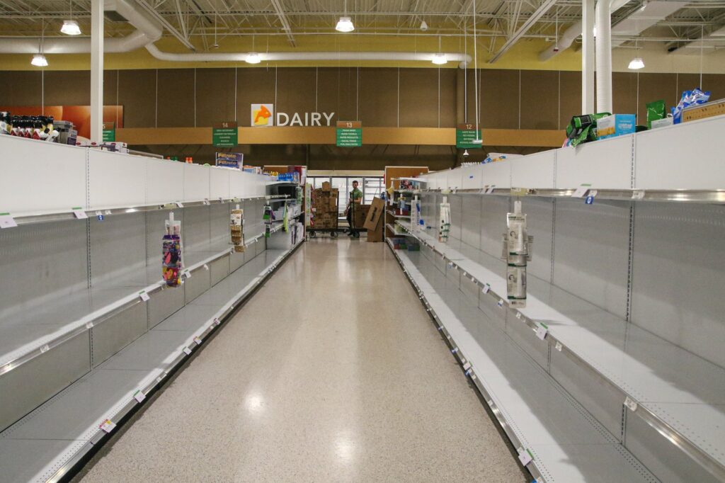empty shelves in grocery store aisle | Innovators Central