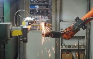 worker welding a piece of metal | Innovators Central